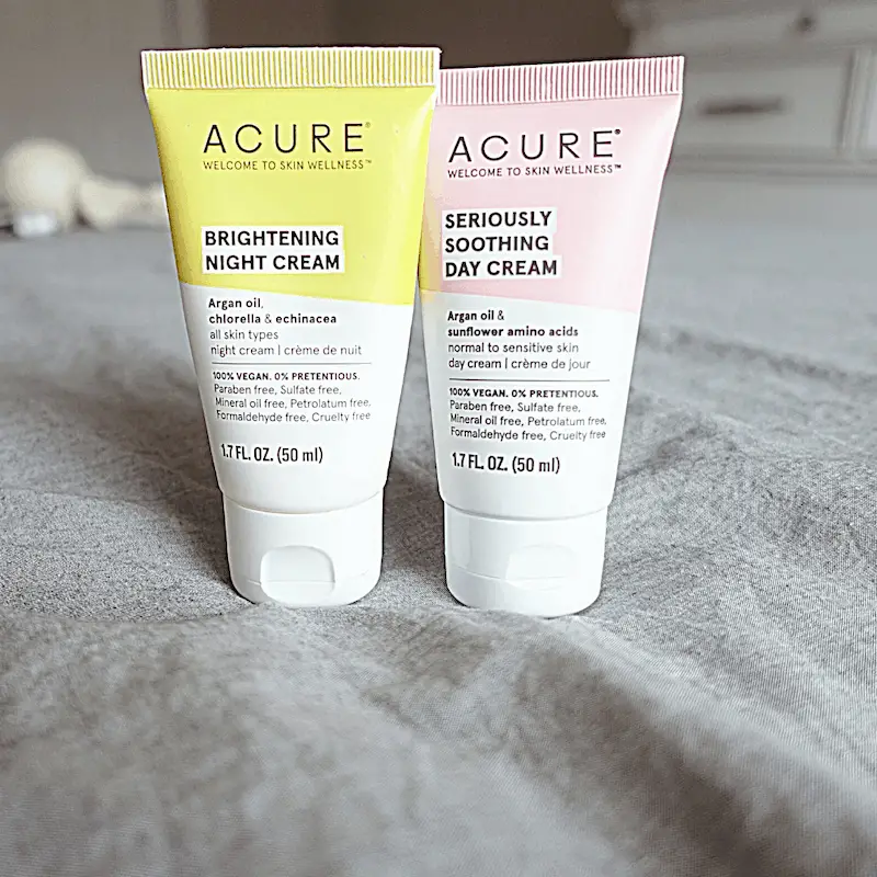 non-toxic face lotion acure brand day cream and acure brand night cream next to eachother