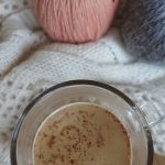 maple pecan latte with a cozy sweater and sweater pumpkins