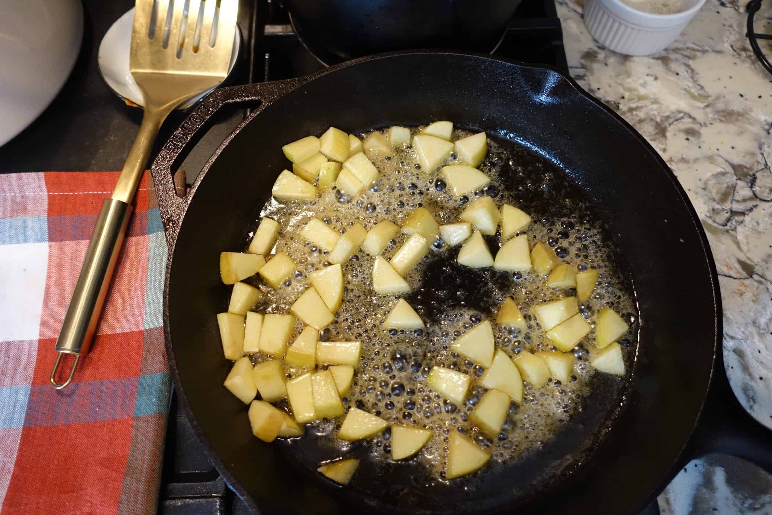 caramelized apples in a cast iron skillet