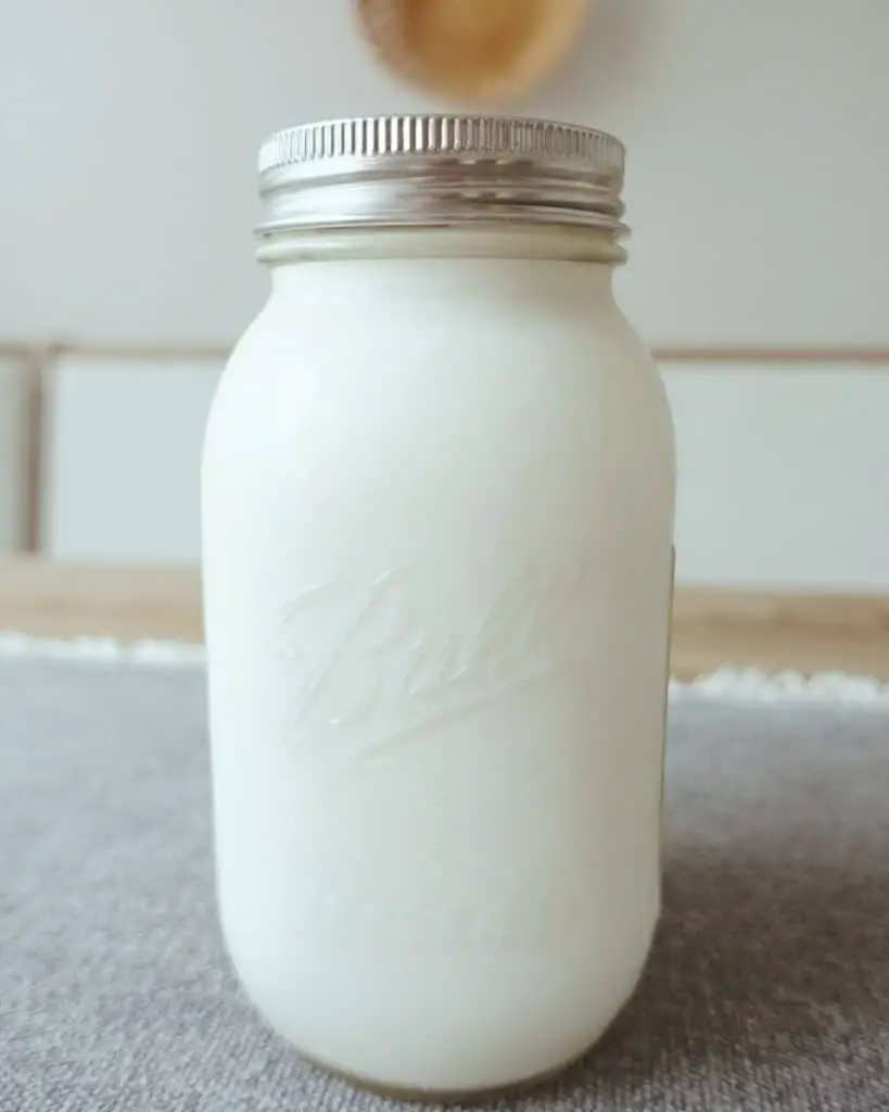 raw goat milk in mason jar from local farm grocery haul