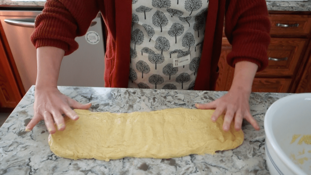 shaping the sourdough for cardamom sourdough bread