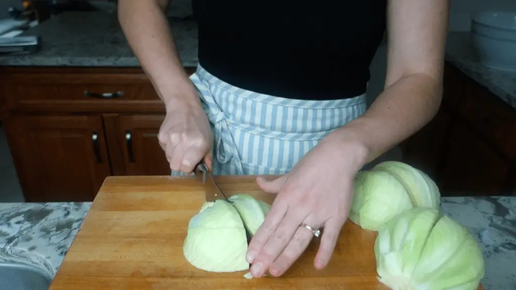 quartering the organic cabbage head