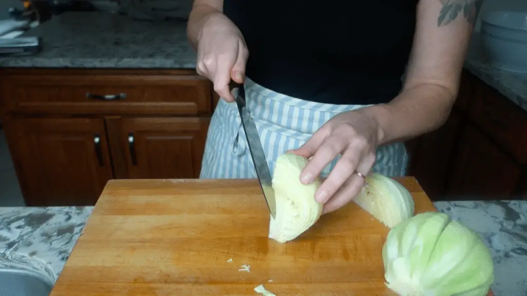 cutting the core off the organic cabbage head