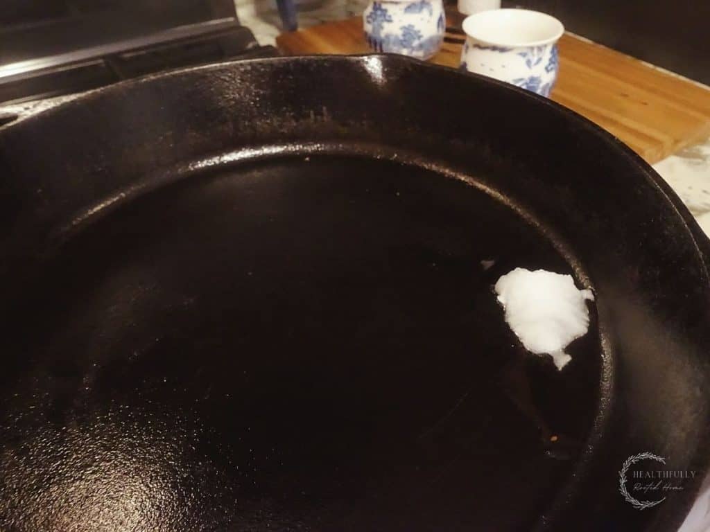 cast iron skillet with coconut oil 