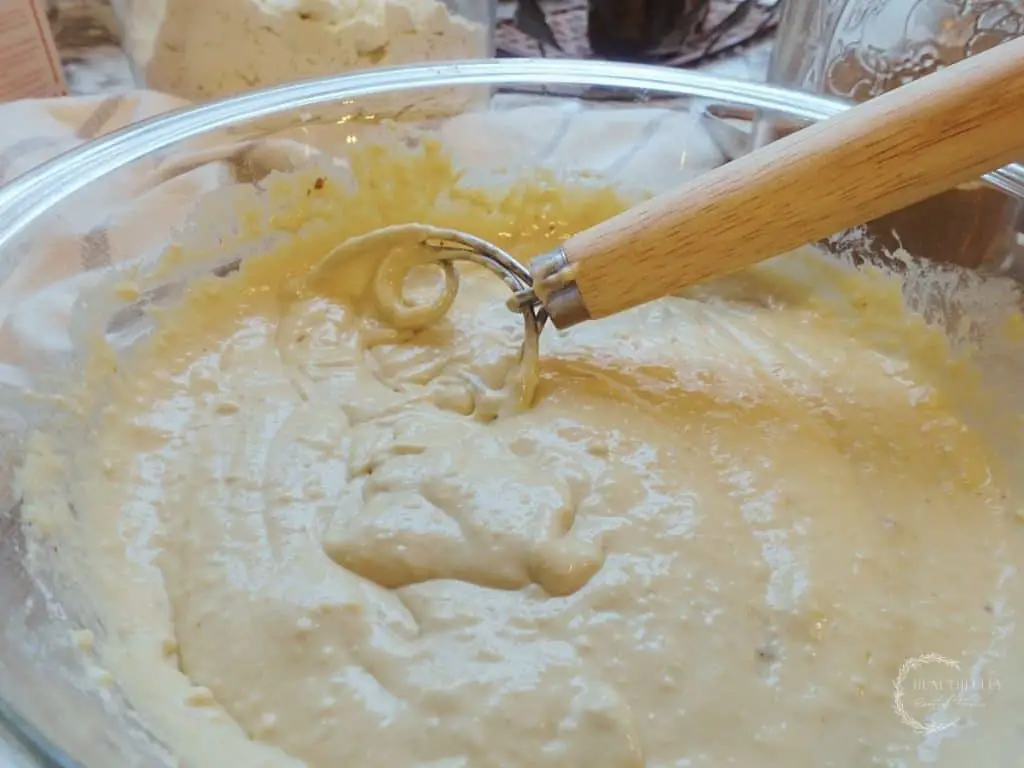 sourdough pancake batter resting with a danish dough whisk