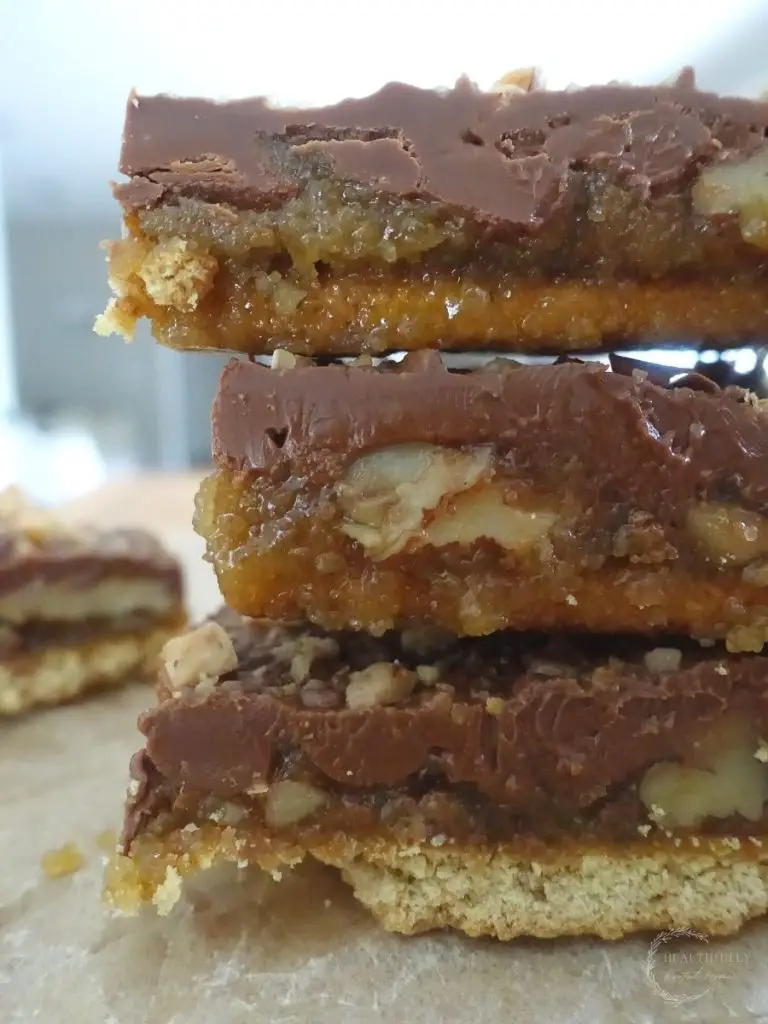 3 graham cracker toffee bars on top of eachother with more in the background