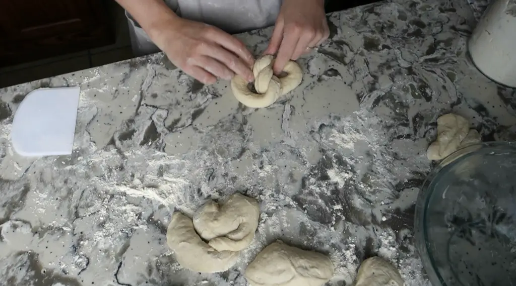 braiding the center of the pretzel dough