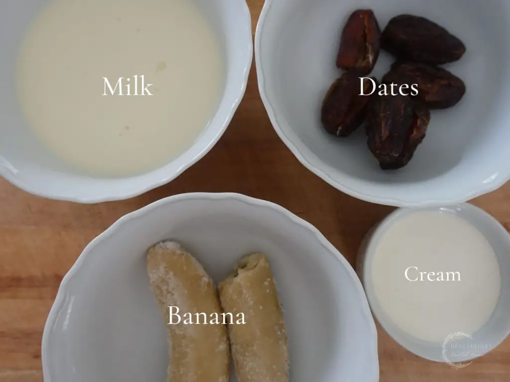 ingredients to make a dates milkshake in white bowls with labels saying what they are