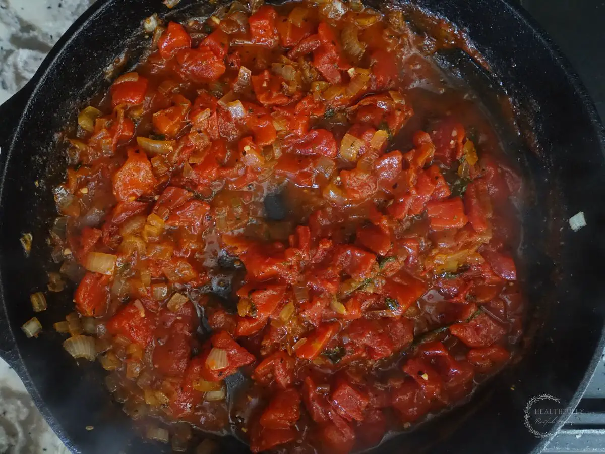 tomato pasta sauce after the tomatoes have been simmered down and thickened