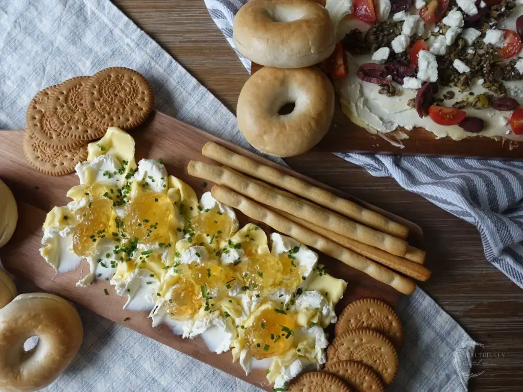 butter boards with various crackers and bread options