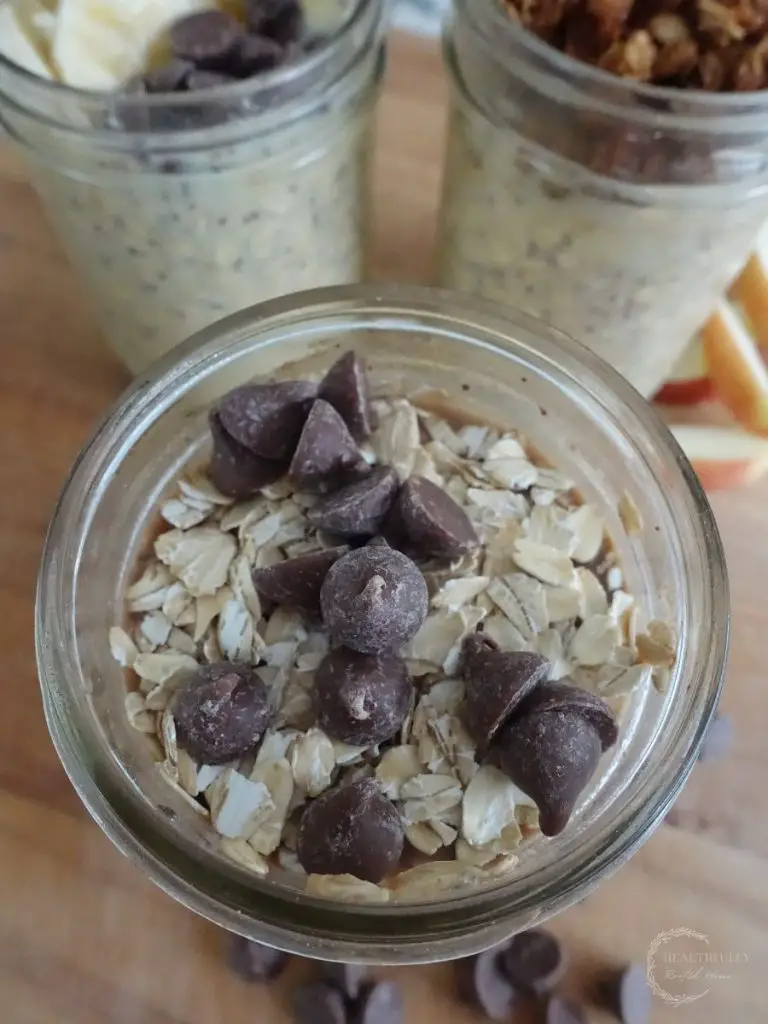 overnight oats topped with chocolate chips and rolled oats with other variations in the background all with high protein recipes