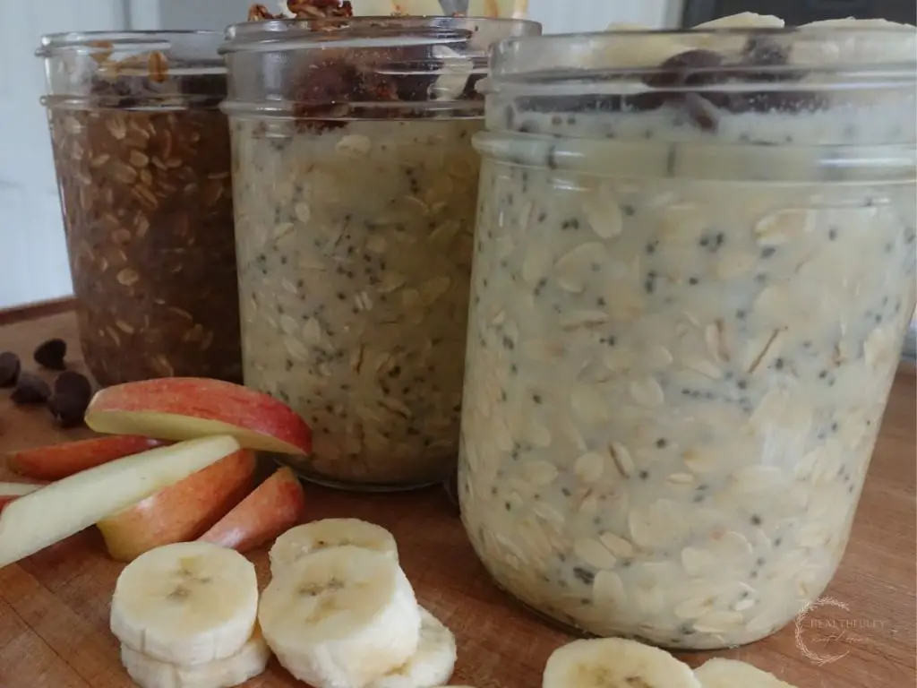 high protein overnight oats in 3 jars using 3 different flavor options and toppings surrounding the jars