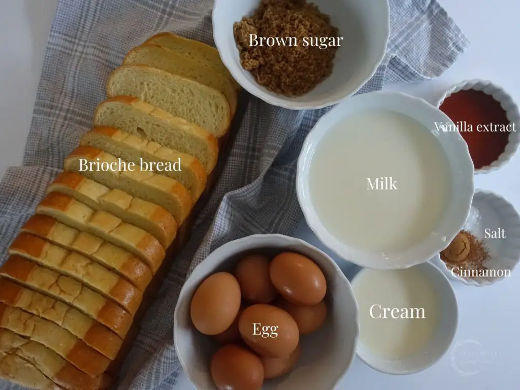 ingredients to make brioche french toast casserole with labels saying what they are