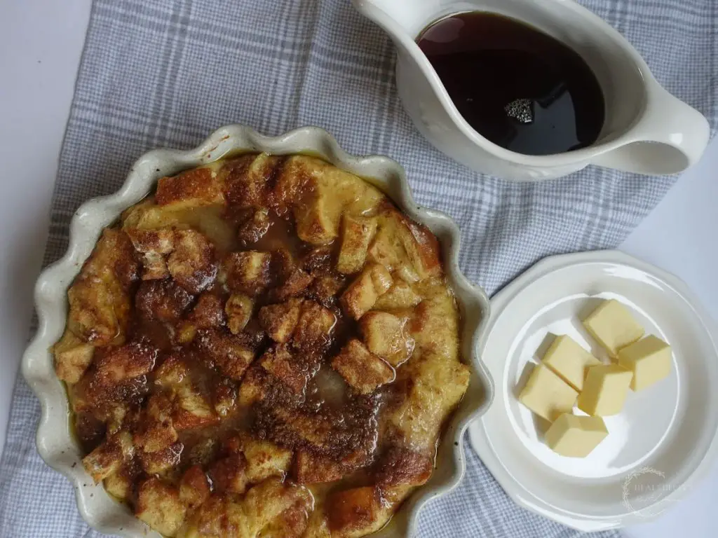 easy make ahead french toast casserole using brioche bread with a side of butter and maple syrup